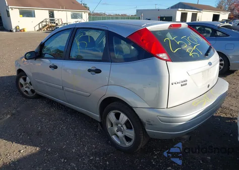 2005 Ford Focus Zx5 from USA, damaged, VIN 3FAFP37N75R135935